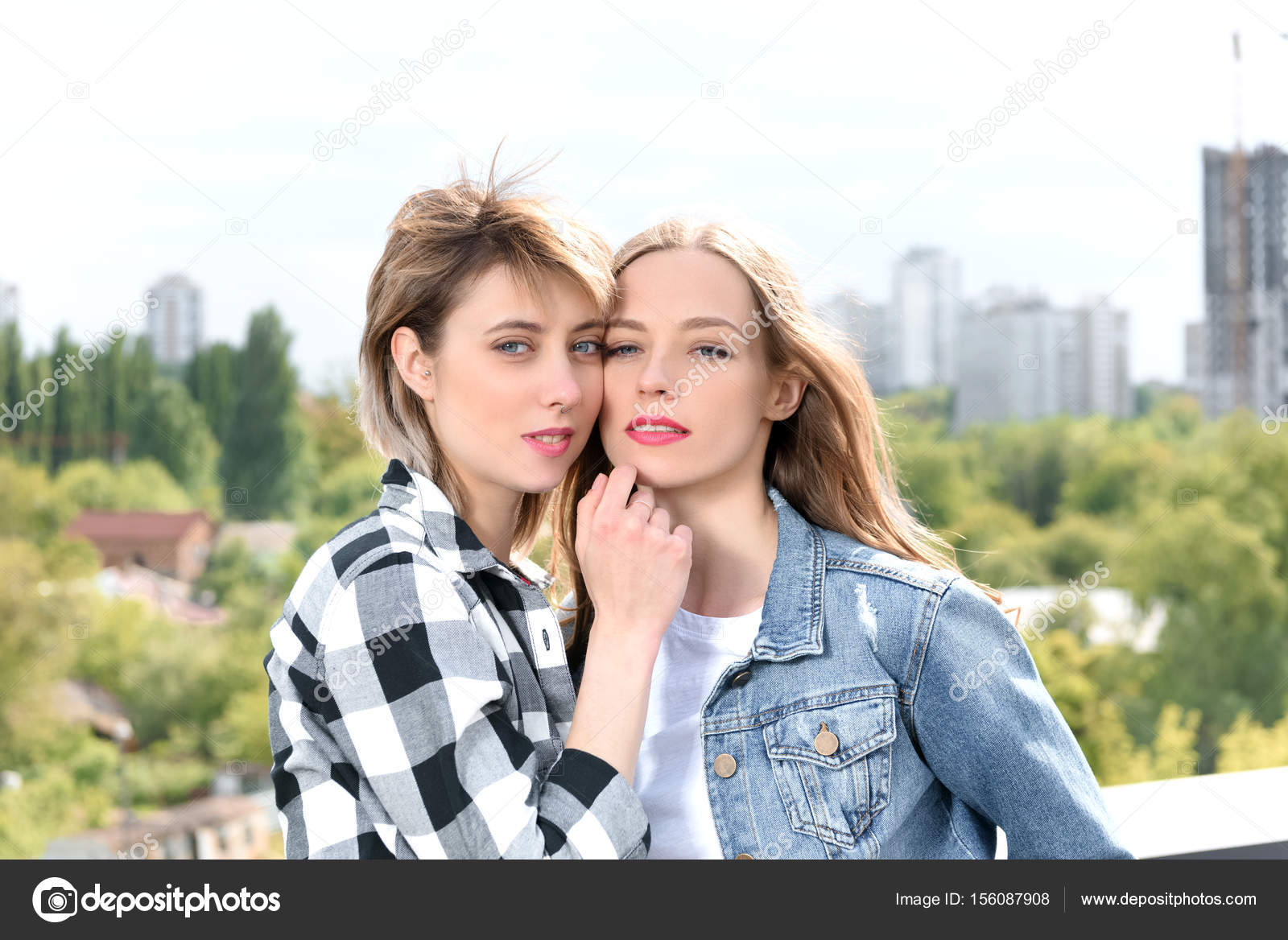 lesbian couple looking at camera — Stock Photo ... lesbian couple looking at camera — Stock Photo ...
