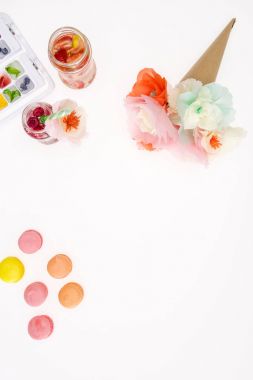 flowers with macaroons and beverages  clipart