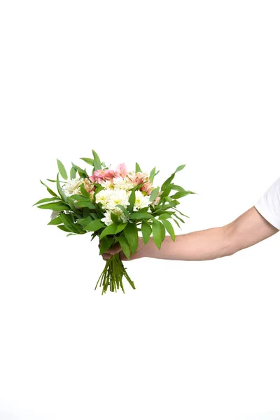 Hand met boeket bloemen — Stockfoto