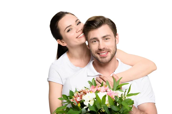 Couple with bouquet of flowers — Stock Photo, Image