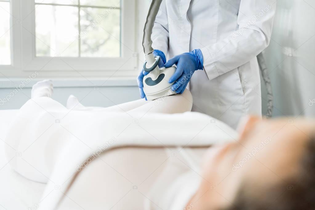 woman having procedure of lipomassage