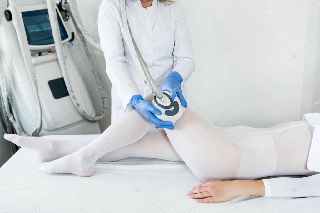 woman having procedure of lipomassage