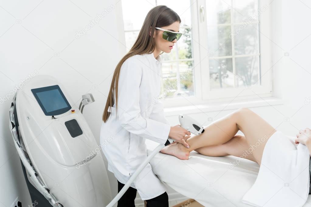 young hair removal therapist