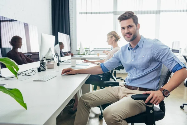 Handsome businessman in office — Stock Photo, Image