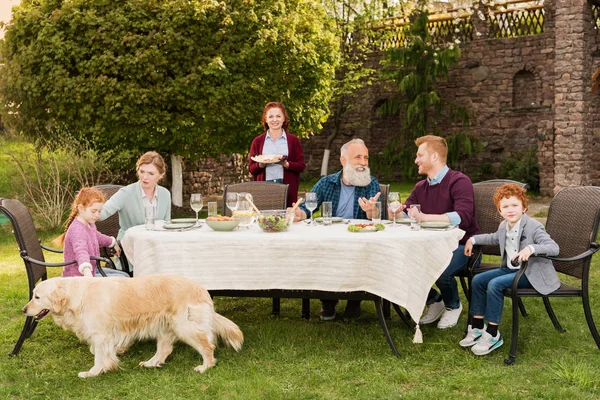 Family having dinner at countryside — Stock Photo, Image