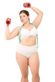 obézní ženy trénink s činkami