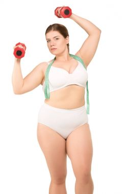kilolu kadın dumbbells ile eğitim