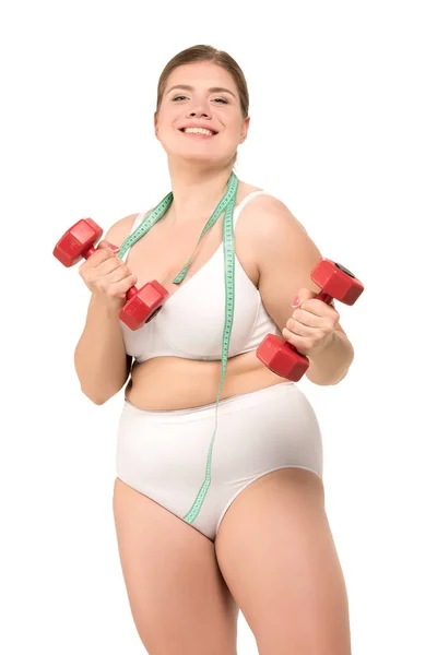 Allenamento donna in sovrappeso con manubri — Foto Stock