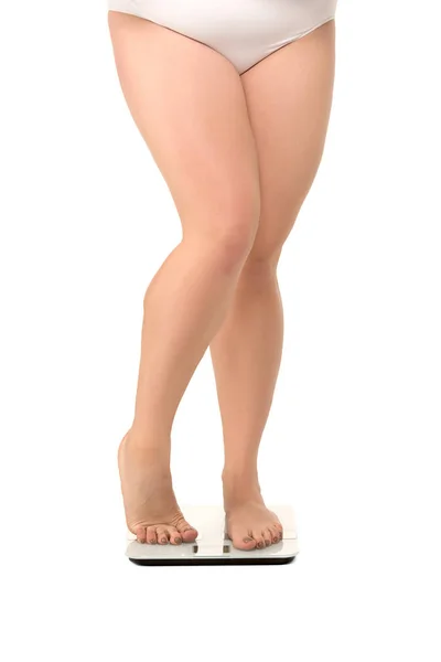 Ženské nohy na váhy — Stock fotografie