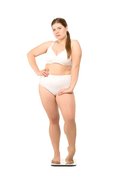 Overgewicht vrouw op schalen — Stockfoto