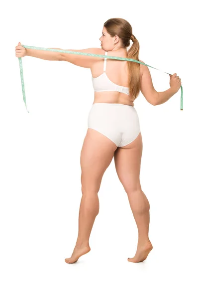 Mujer posando con cinta métrica — Foto de Stock