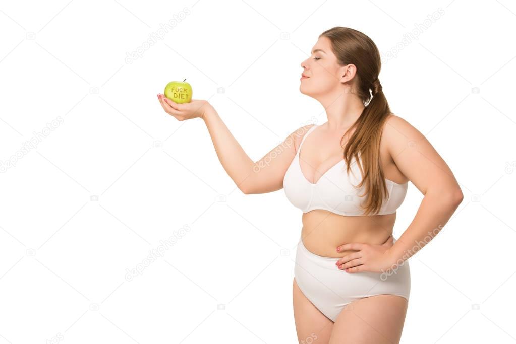 Fat woman holding apple