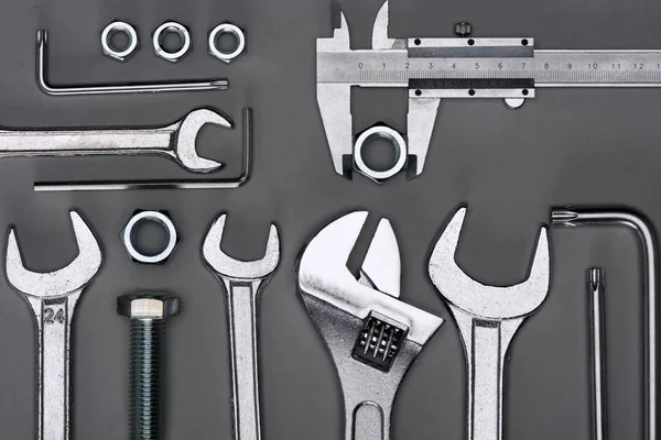 Top view of set of various work tools on grey — Stock Photo