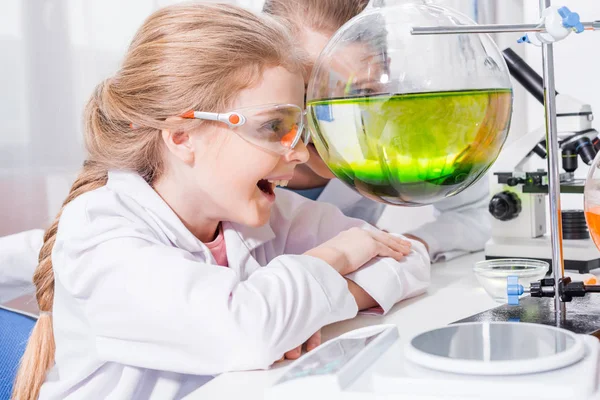 Teacher and student in chemical lab — Stock Photo