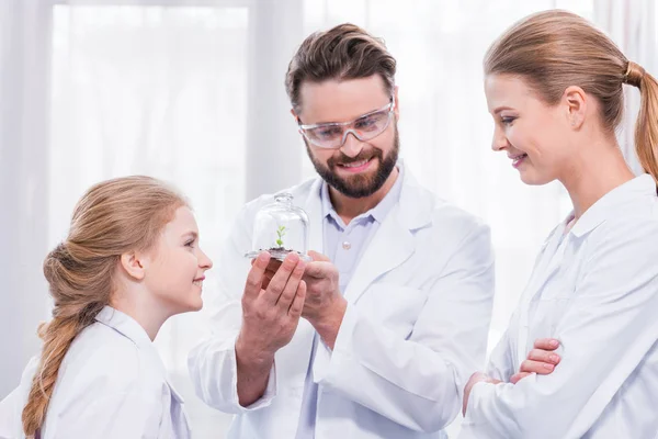 Teachers and student in lab — Stock Photo