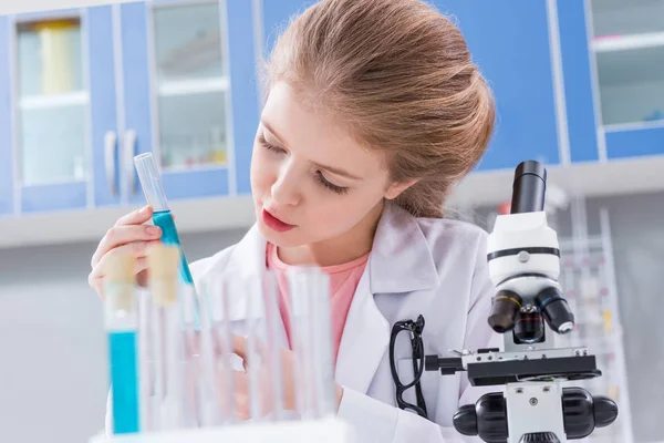 Girl in chemical lab — Stock Photo