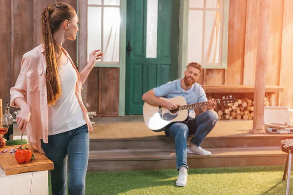 Couple resting on porch — Stock Photo