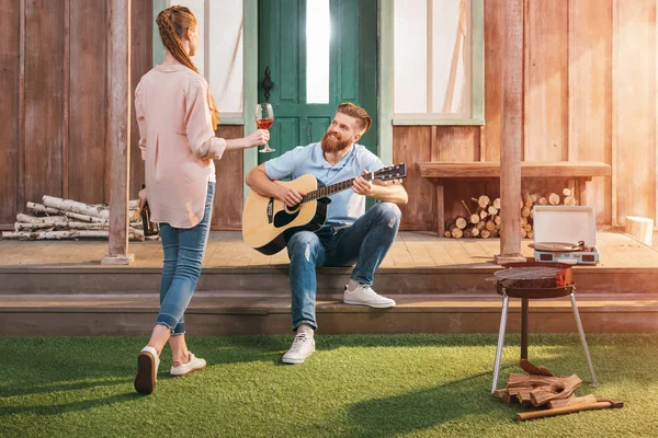 Couple resting on porch — Stock Photo