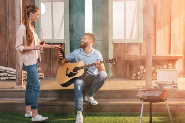 Couple resting on porch — Stock Photo