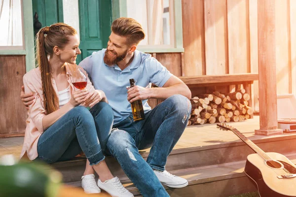 Couple resting on porch — Stock Photo