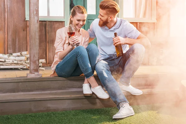 Couple resting on porch — Stock Photo