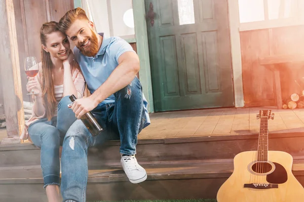 Couple resting on porch — Stock Photo