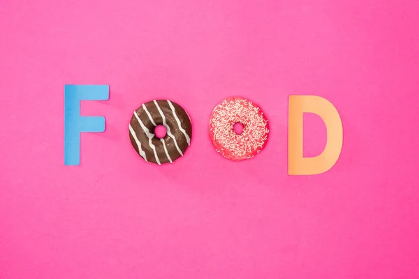 Palavra comida feita de donuts — Fotografia de Stock