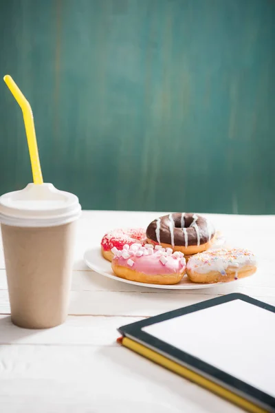 Breakfast with coffee and donuts — Stock Photo
