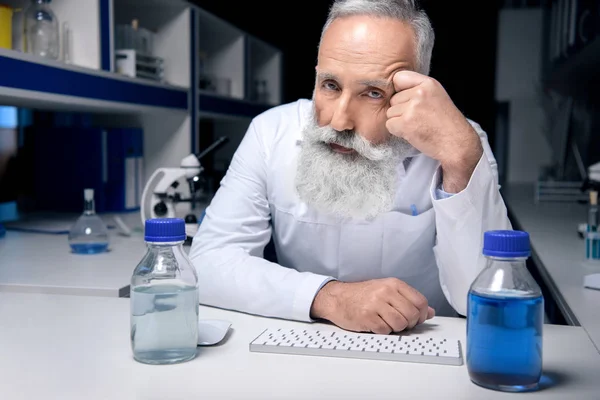 Senior scientist at workplace — Stock Photo