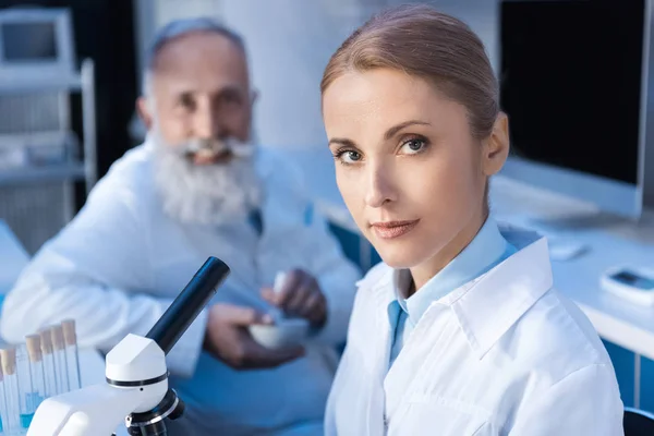 Scientists working at laboratory — Stock Photo