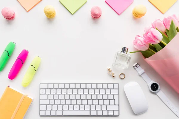 Pink tulips and keyboard — Stock Photo