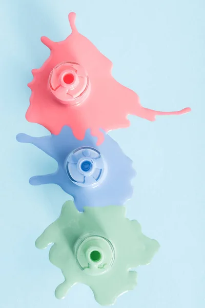 Spilled colorful nail polishes — Stock Photo