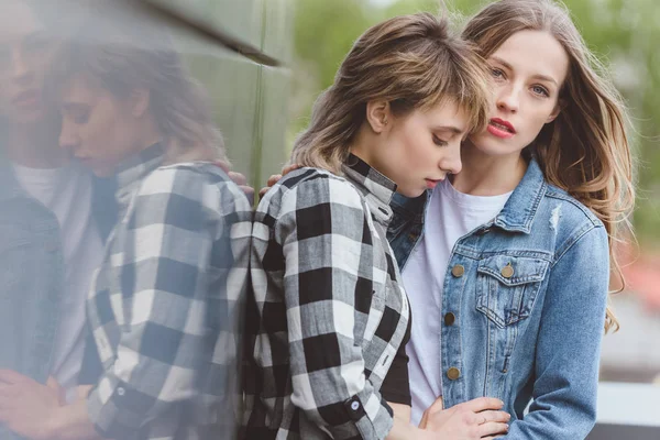 Sensual lesbian couple standing together — Stock Photo
