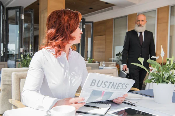 Mature businesswoman waiting for meeting — Stock Photo