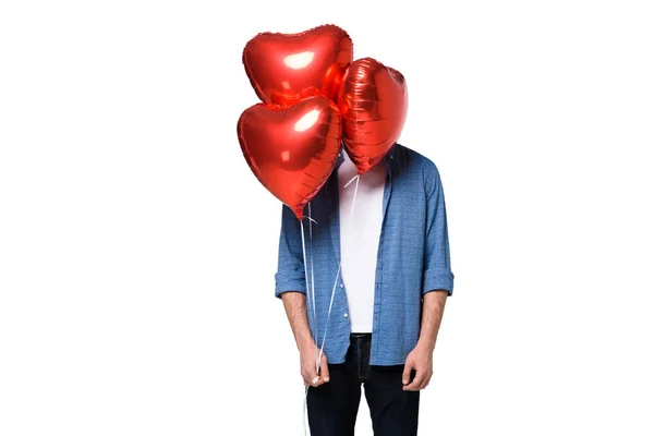 Hombre con globos en forma de corazón — Stock Photo