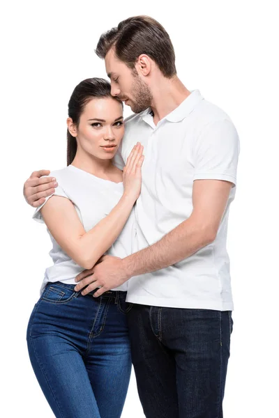 Joven abrazando pareja - foto de stock