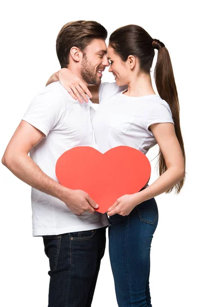 Couple holding red heart — Stock Photo