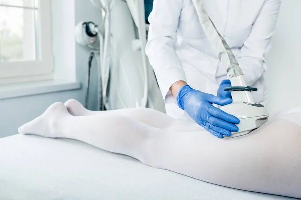 Woman having procedure of lipomassage — Stock Photo