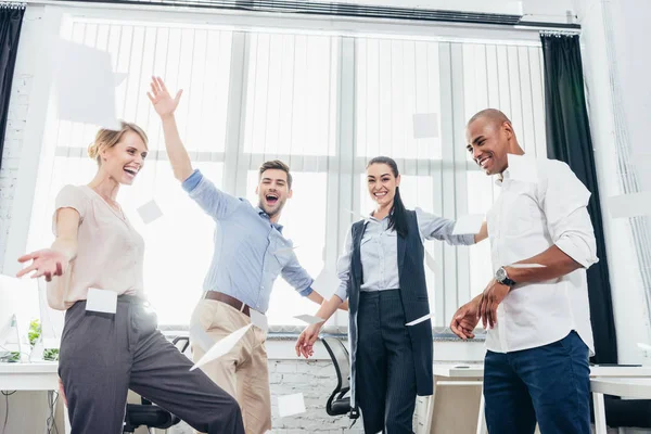 Triumphing business colleagues — Stock Photo