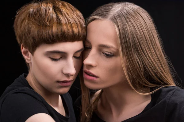 Lesbian couple touching cheeks — Stock Photo
