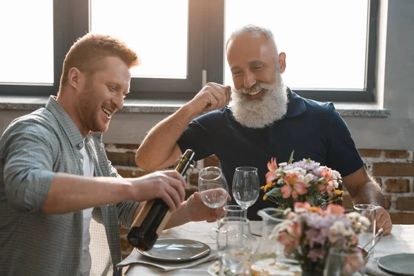 Men drinking wine — Stock Photo