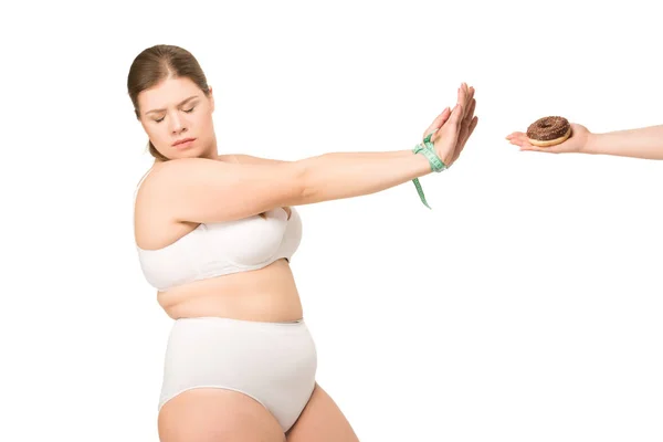 Mujer se niega a comer donut - foto de stock