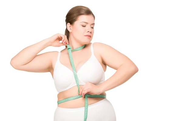 Woman measuring body — Stock Photo