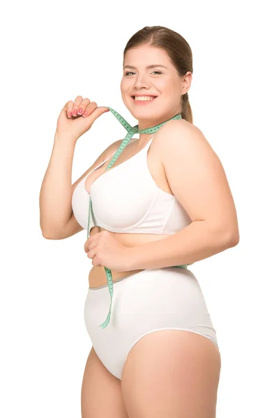 Overweight woman measuring body — Stock Photo