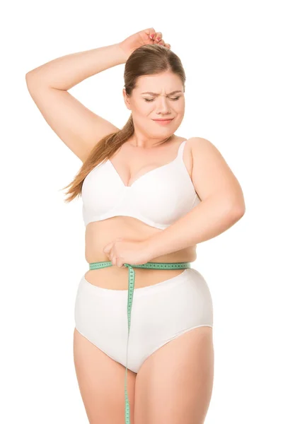 Woman measuring waist — Stock Photo