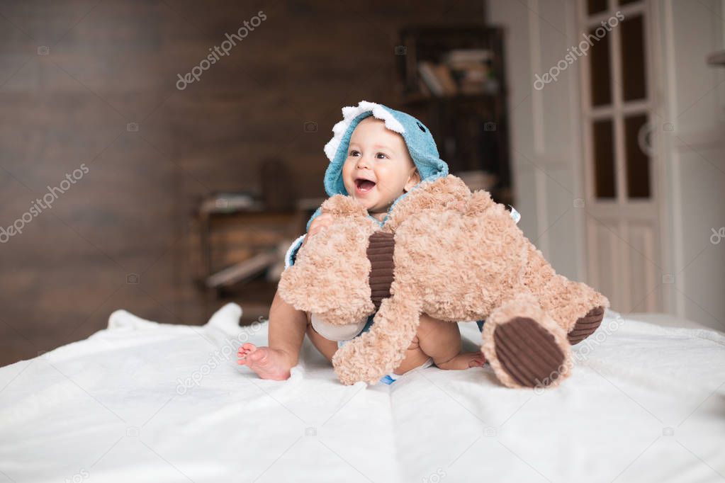 baby boy with teddy bear
