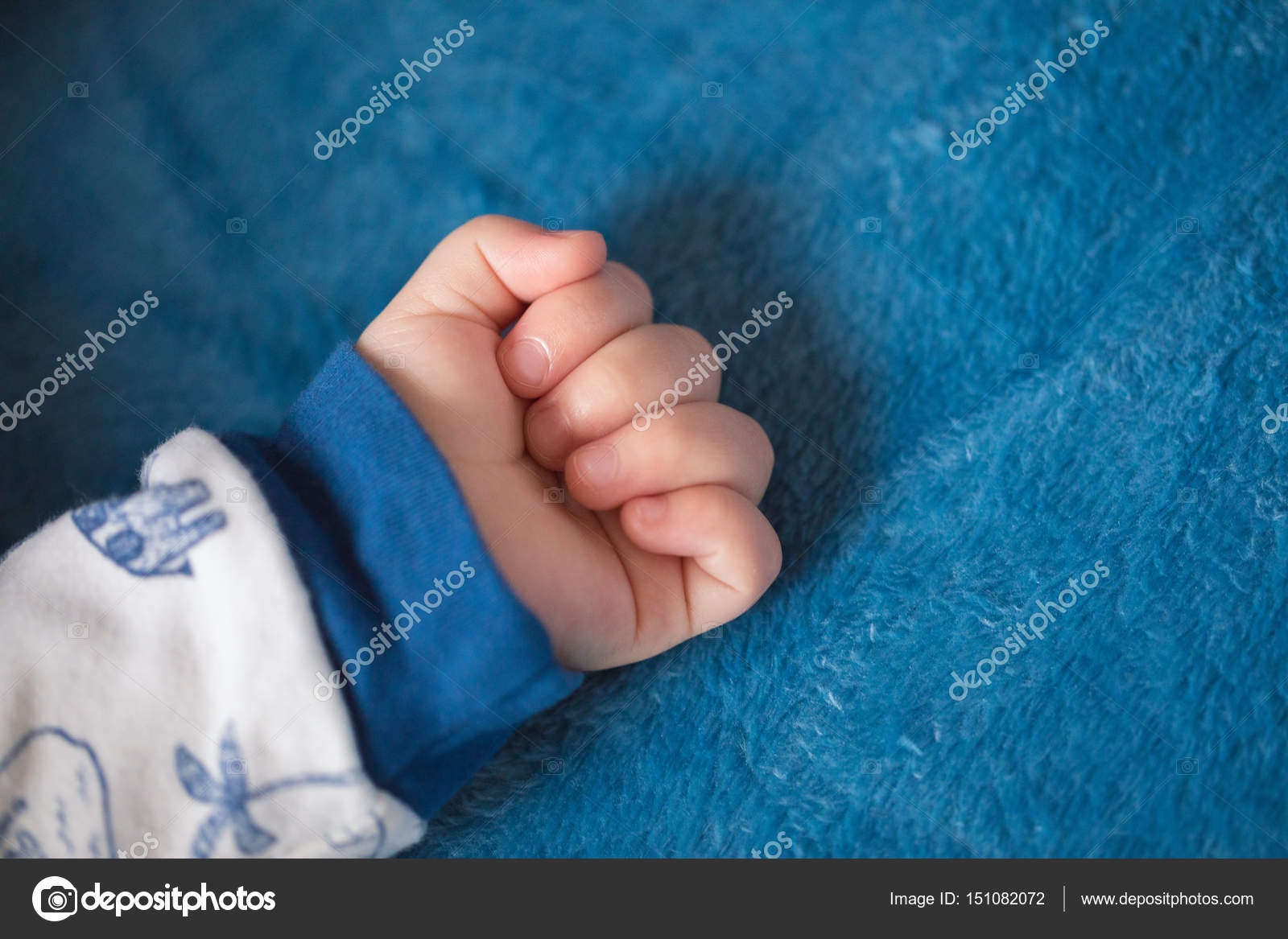 Hand of sleeping toddler Stock Photo by ©LenaMiloslavskaya 151082072