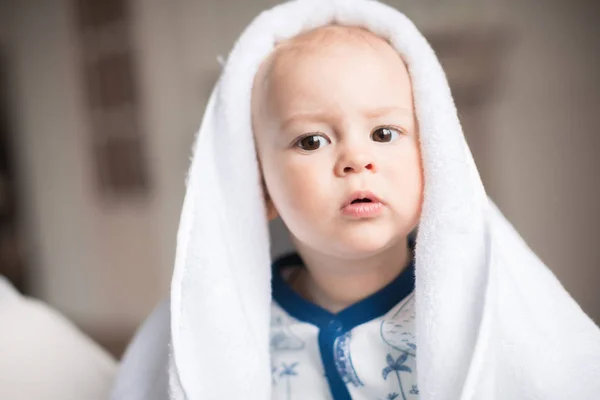 Baby boy with white towel — Stock Photo, Image