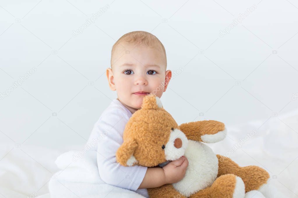 Baby boy with teddy bear  