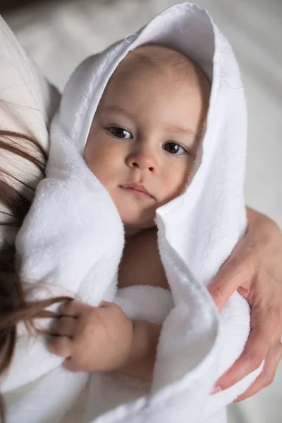 Boy covered in towel after bath — Stock Photo